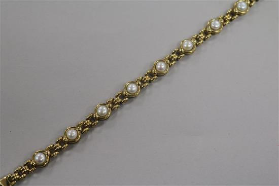 A modern 9ct gold and mabe pearl set bracelet. approx. 18cm.